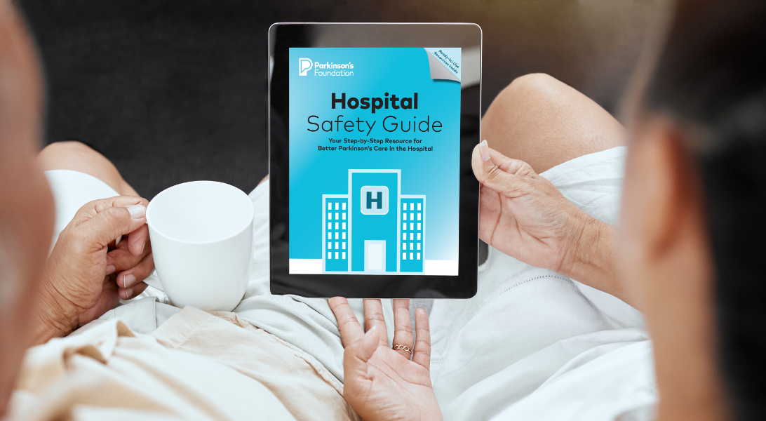 Couple looking at the Hospital Safety Guide on a tablet