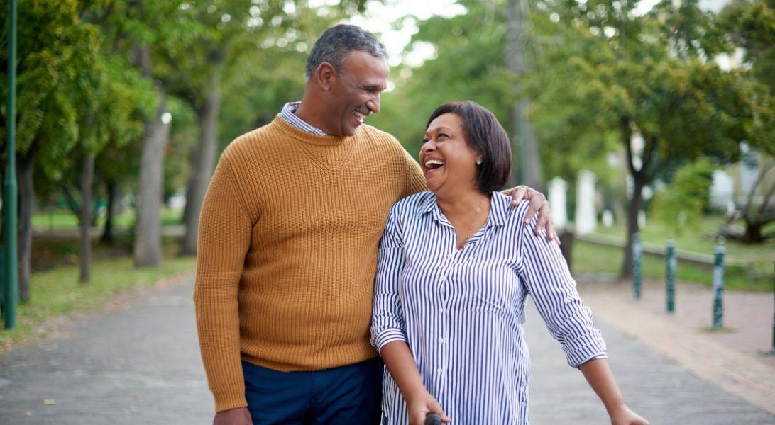 Husband and wife walking in the park