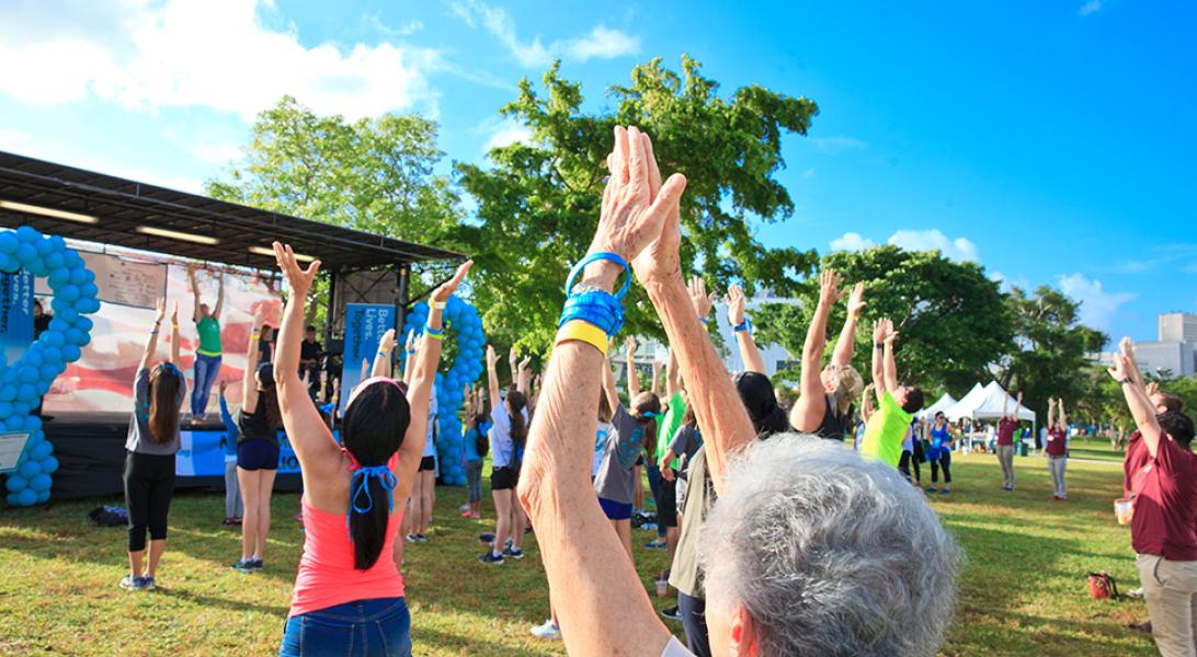 People stretching at Moving Day Miami