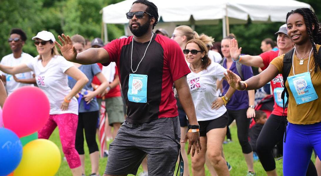 People dancing at the Moving Day walk for Parkinson's