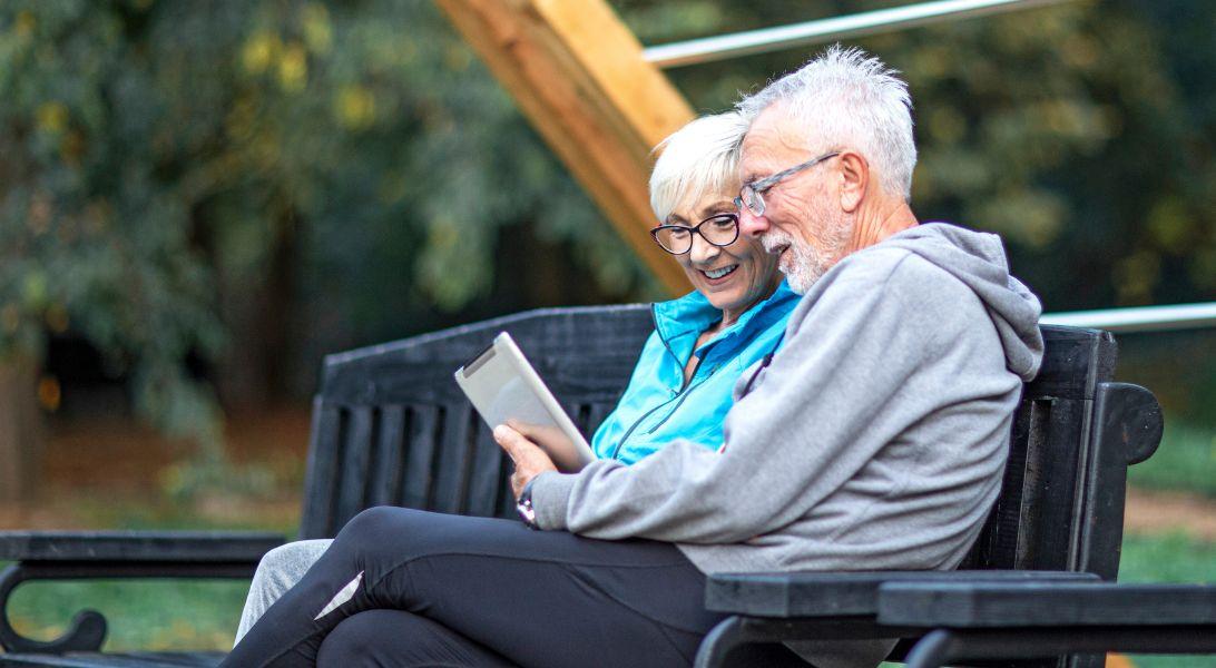 Couple reading on a bench