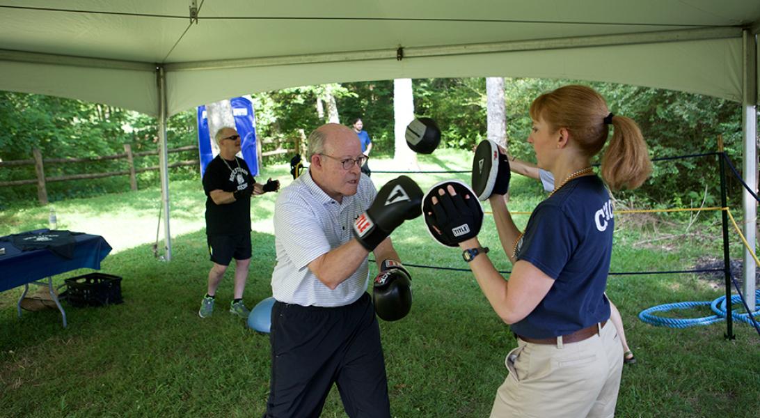 Two people boxing at the Moving Day walk