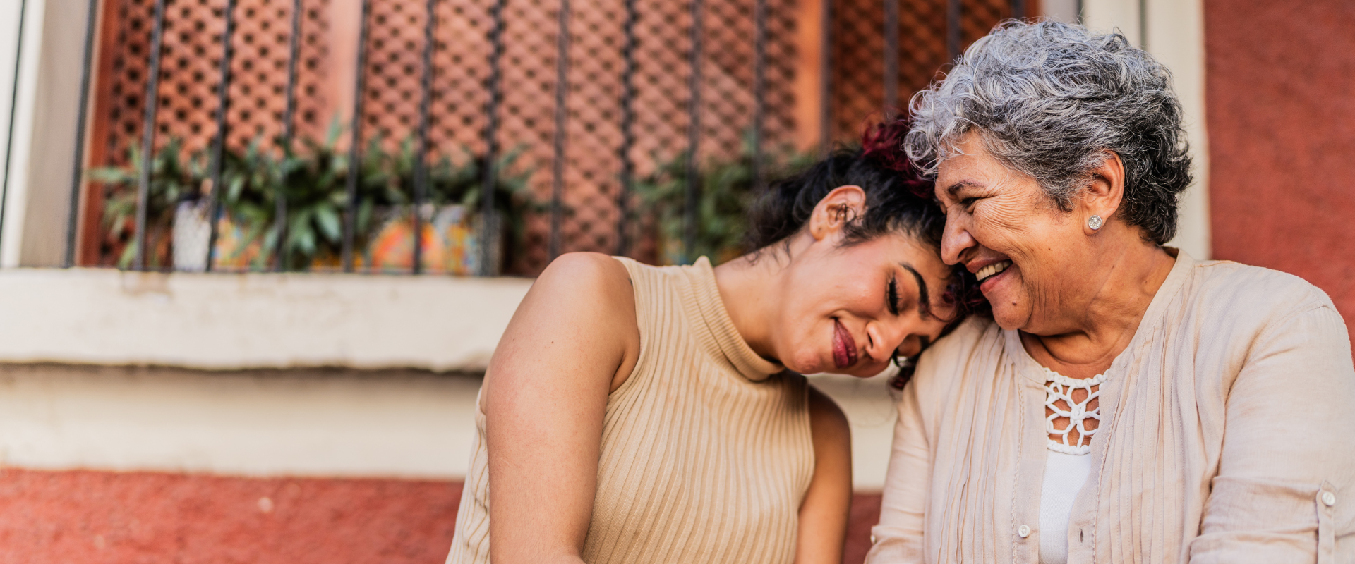 Mother and daughter hugging