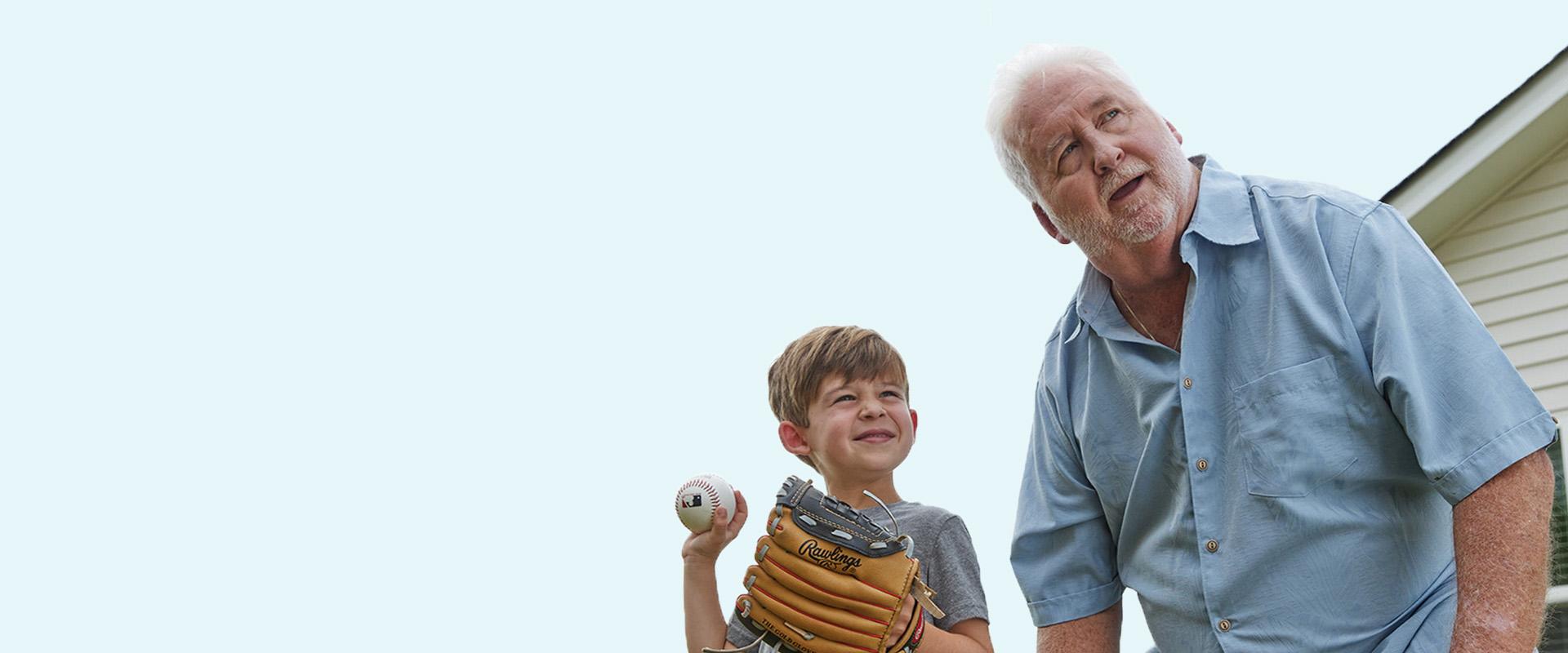 Bubba and his grandson playing baseball
