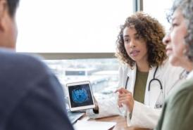 Doctor going over brain scan with patients