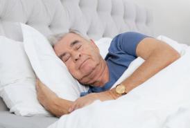 Man sleeping in bed