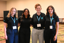 Group of four PD staff posing for a picture