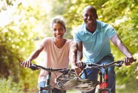 A couple biking together