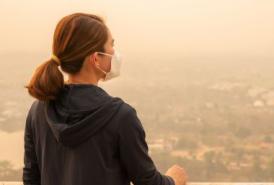 woman wearing a mask to protect from air pollution