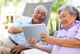 Couple interacting with a tablet