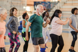 Group of people dancing at exercise class