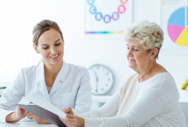 Woman talking with medical professional