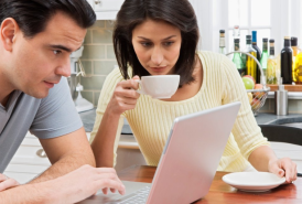 Couple on a computer