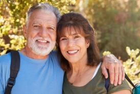 Couple hugging while hiking