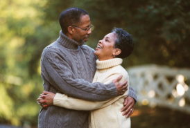 couple hugging outside