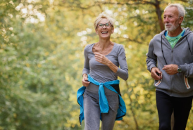 Older couple jogging together