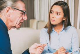 Man talking to therapist