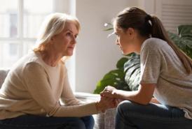 Woman talking to her daughter