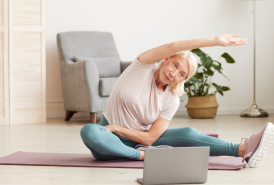 Woman stretching on a mat