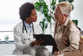 Specialist consulting a patient at the clinic