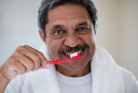 Man brushing his teeth