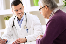 Man talking to his doctor