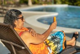 Woman sitting outside in the sun