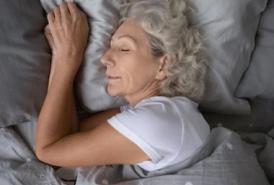 Woman sleeping in bed