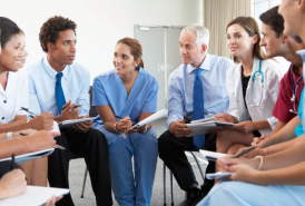 Group of medical professionals talking