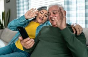 Couple video chatting on their phone