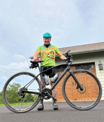 Scott Harrison riding his bike