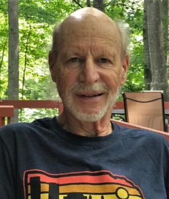 Bruce Closser sitting on porch