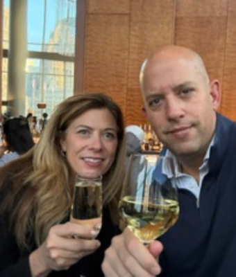 Jen and Rocky enjoying a glass of wine