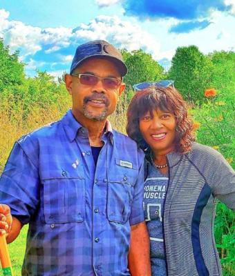 Richard and his wife outside