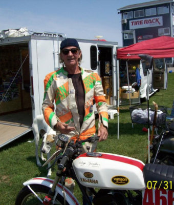 Teddy Horn posing with motorcycle