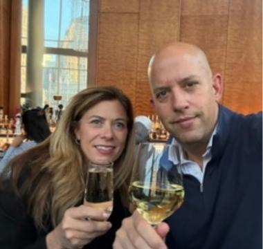 Jen and Rocky enjoying a glass of wine