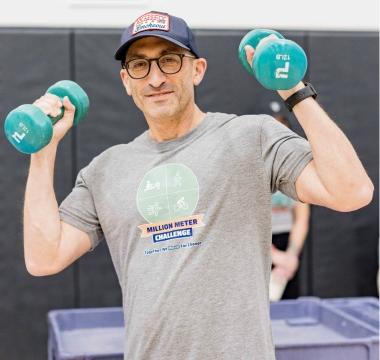 Jordan lifting weights at an event