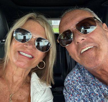 Karen and Mark with sunglasses on, smiling