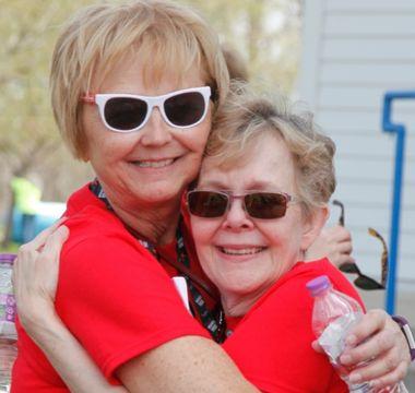 Christine hugging family at Moving Day