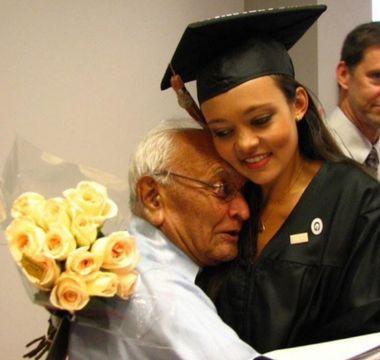 Neelam hugging her grandfather at her graduation