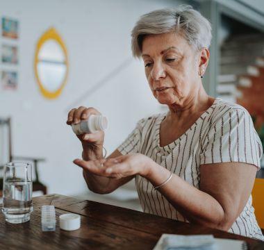 Woman taking medication 