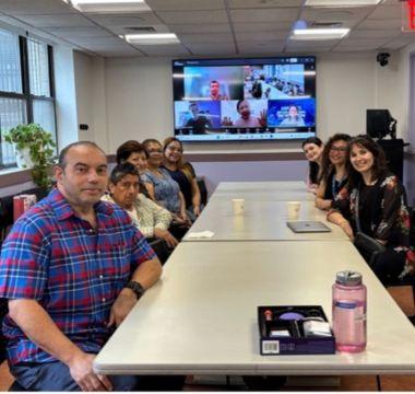 A group of people at a conference table