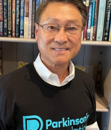 Gil Kim wearing a Parkinson's Foundation shirt