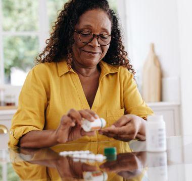 Woman taking medication 