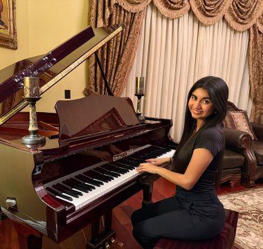 Kasey Moore playing the piano