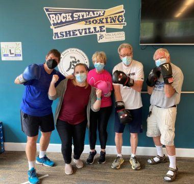 Mike Horak with group at boxing class