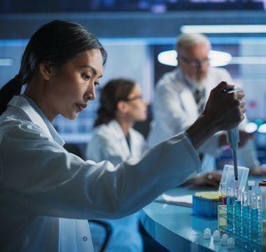 Doctor Working With Test Tubes
