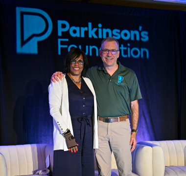 2 people on stage at the 2025 Summit