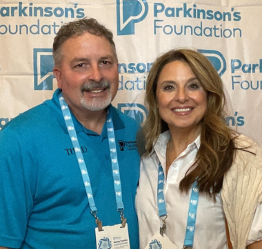 2 people posing for picture at a past Volunteer Summit