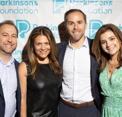 Four family members posing at a PF event